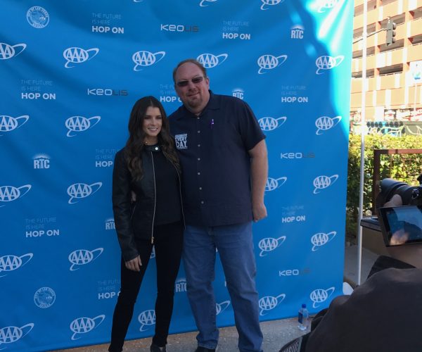 Danica Patrick and Marlo posing for photos at vegas event